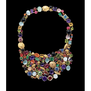 An incredible statement necklace piece with large faceted gems in a rainbow of colour